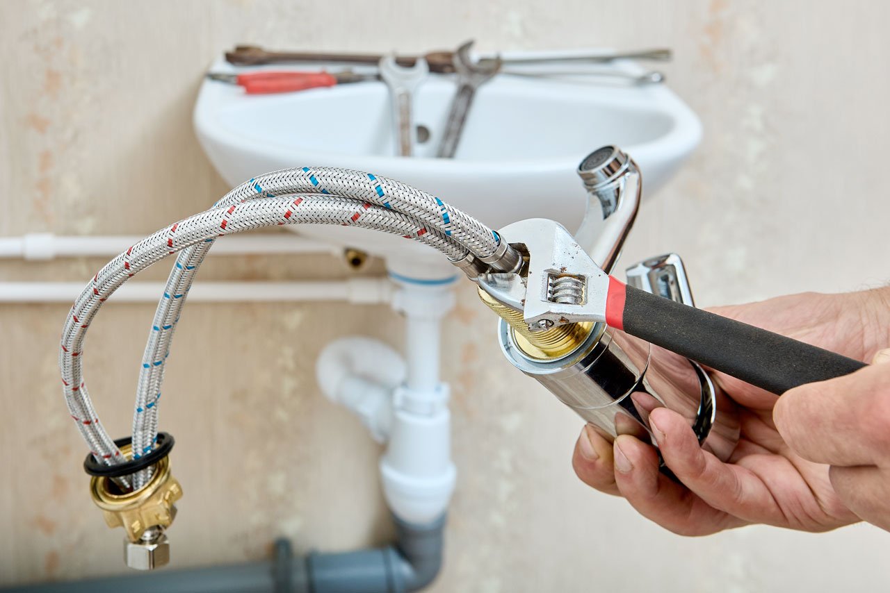 plumber dunstable installing sink tap and bathroom fixtures professionally