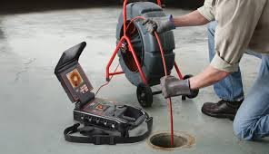 boiler service dunstable engineer explaining service to customer at home